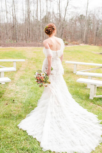 Bride with bouquet at Georgia wedding venue in March