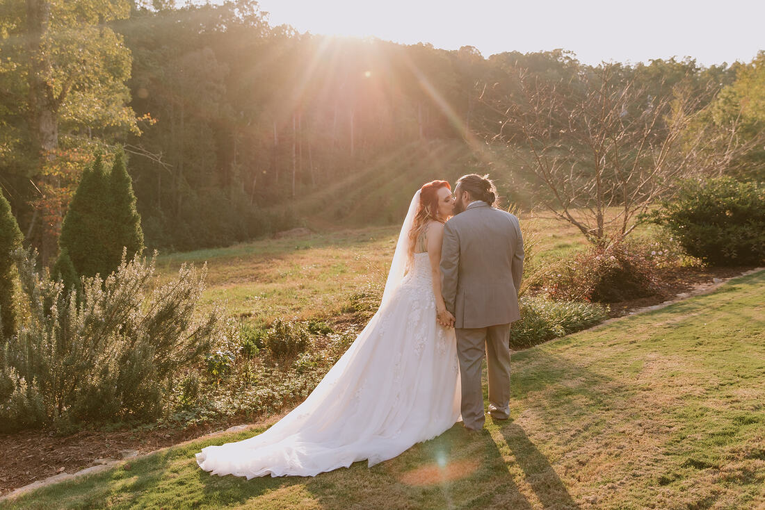 Bride and groom at sunset at North Georgia Wedding Venue