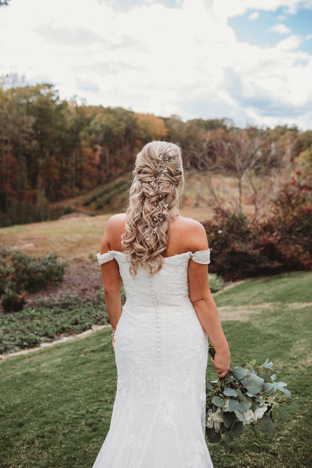 Boho bridal hairstyle at Georgia farm wedding venue