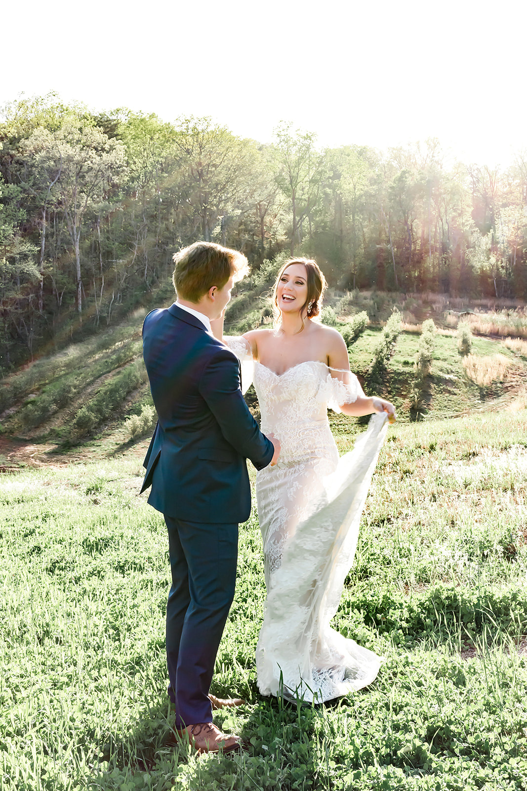 Bride and groom dancing at blueberry fields in North Georgia venue