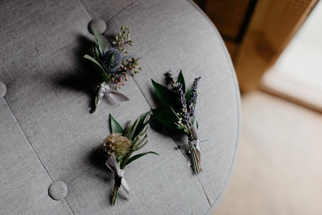 Organic style boutonnieres by Stems Atlanta