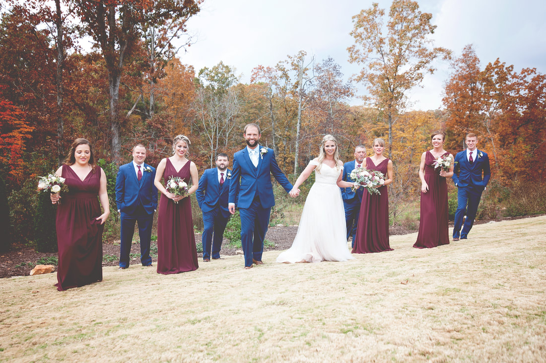 Bridal party with fall leaves in North Georgia