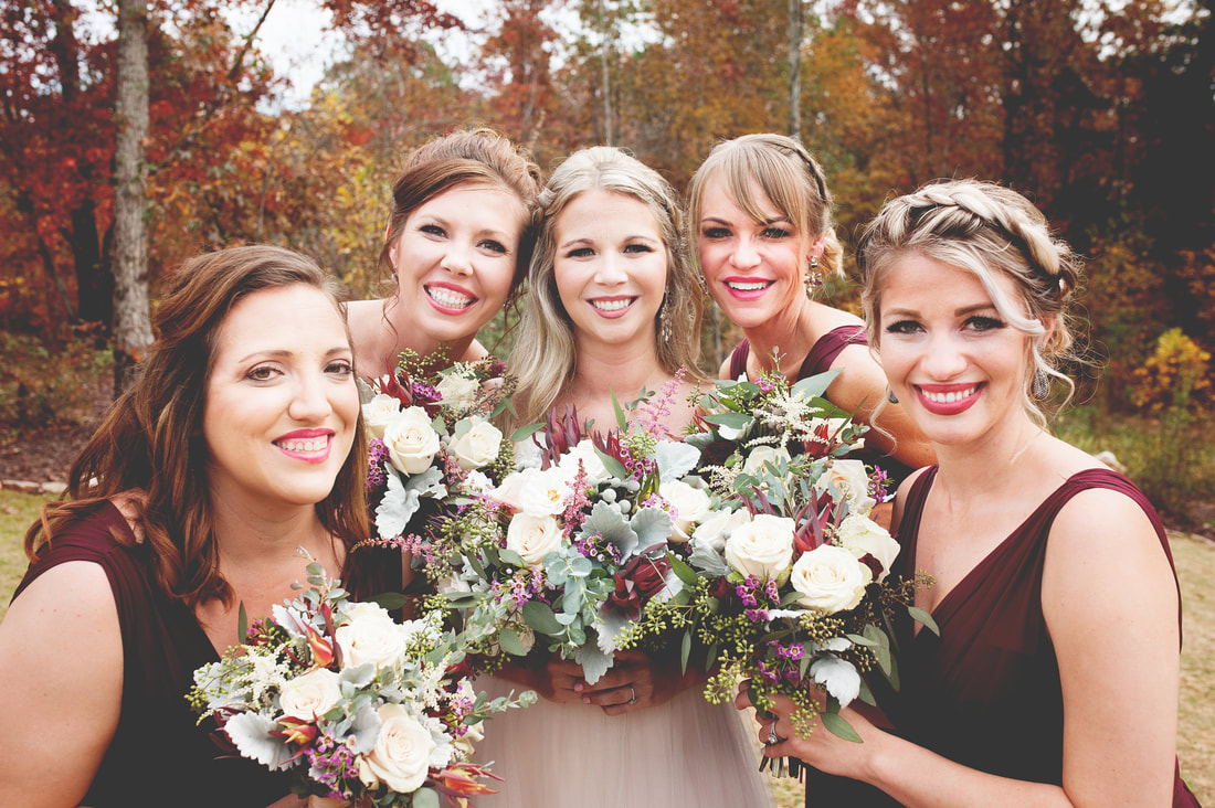Fall wedding with bridal party bouquets