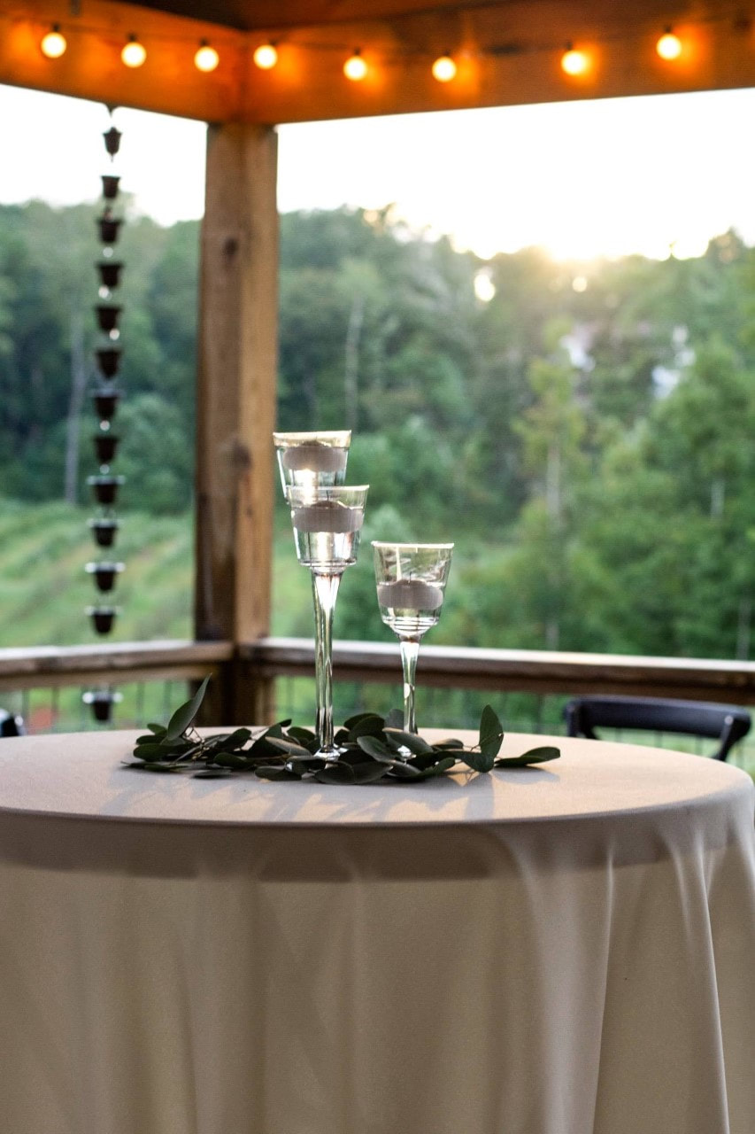 Cocktail hour on covered porch at North Georgia wedding venue
