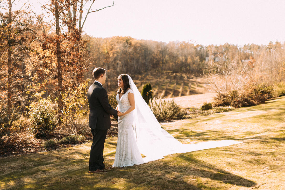 Bride and groom first look in Fall in Canton, Ga