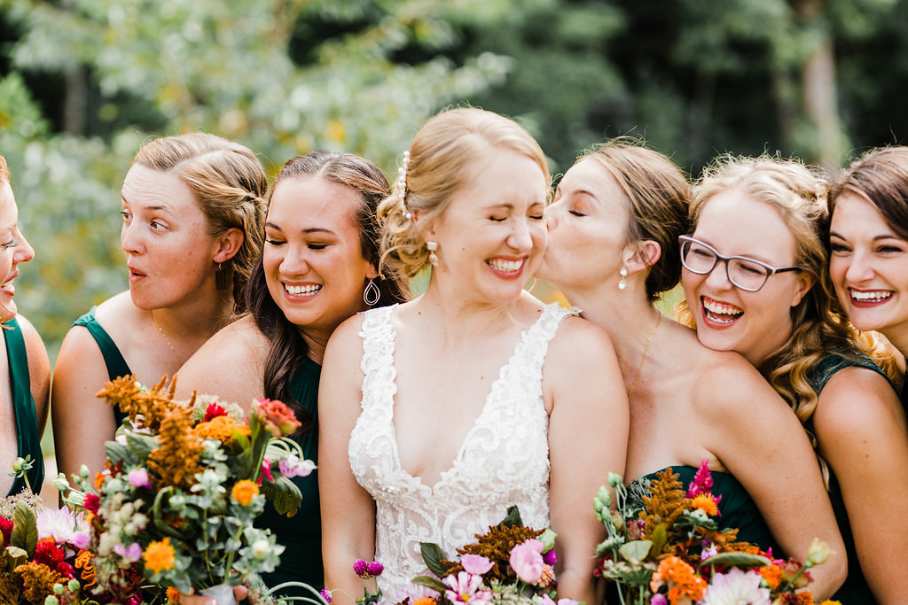 Bride and bridesmaids with local flowers at North Georgia venue