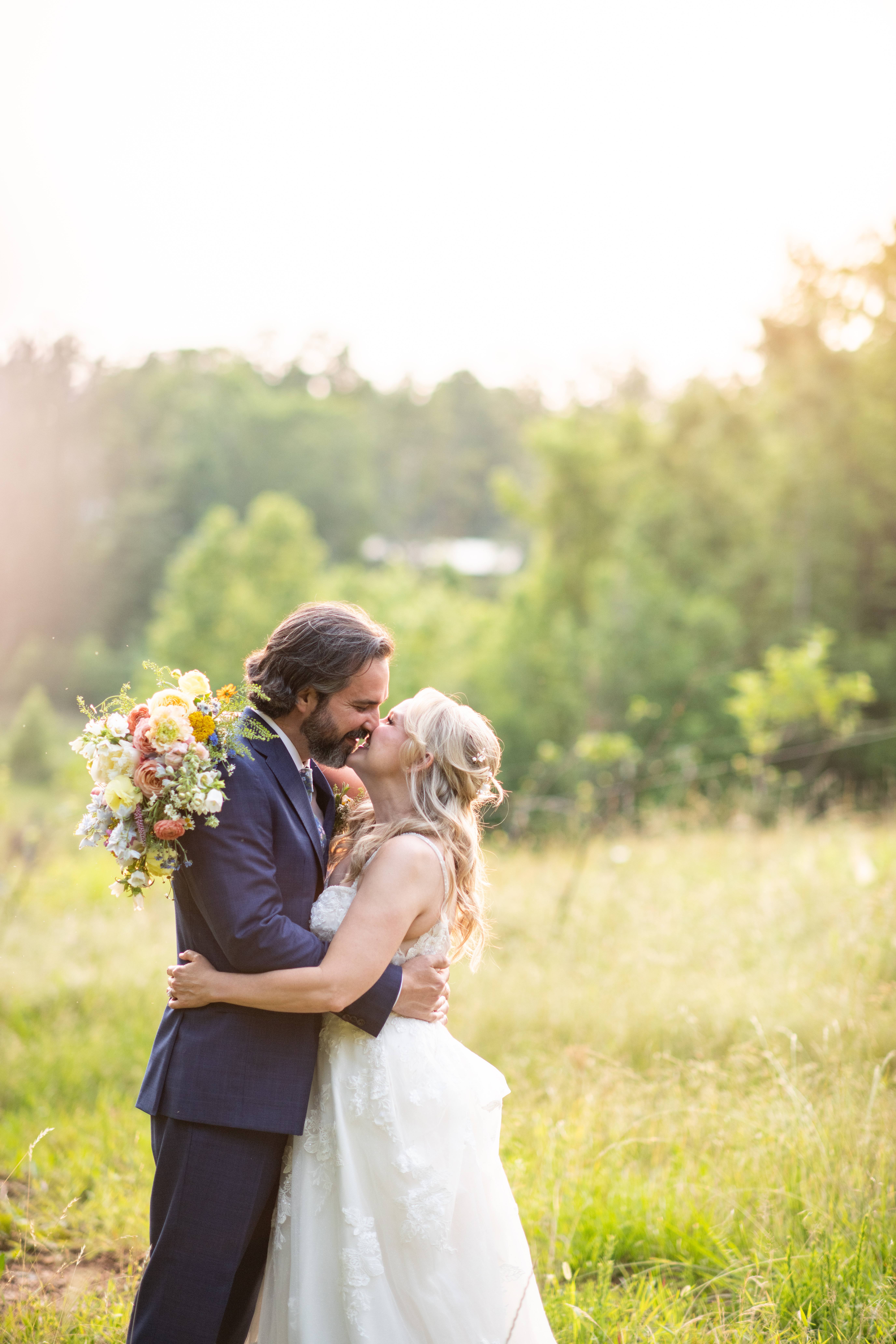 Couple enjoying spring farm to table wedding at North Georgia wedding venue